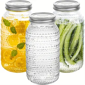 Three-pack of large 64oz wide-mouth glass Mason jars with lids - Heavy-duty leak-proof Preserving Containers jars for pickling, jam making, food preparation, salad storage. Dishwasher safe, airtight seal, versatile for crafts and table centerpieces.