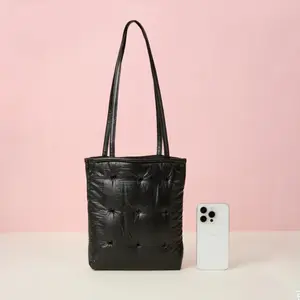 MINISO sparkling silver mini tote bag with perforations, softly padded perforated small handbag, lightweight shoulder bag—perfect for women’s everyday street style and Y2K fashion