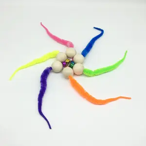 Interactive chasing of toys between pet cats and dogs: wooden balls with bells and plush tails