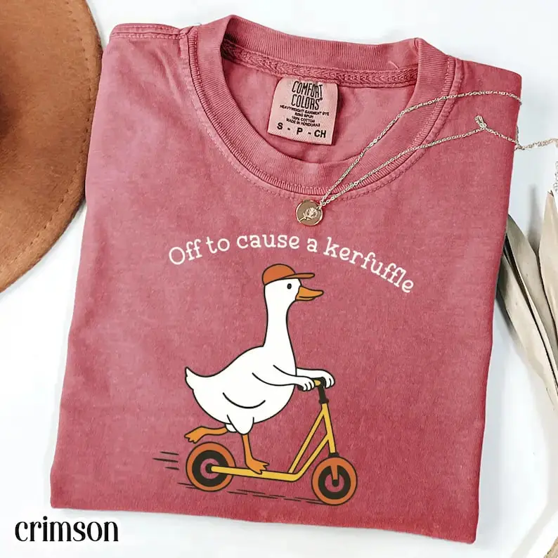 Comfort Colors “Off To Cause A Kerfuffle” T-shirt featuring a funny goose scooter and silly duck design, sarcastic adult humor tee with playful mental health vibes.