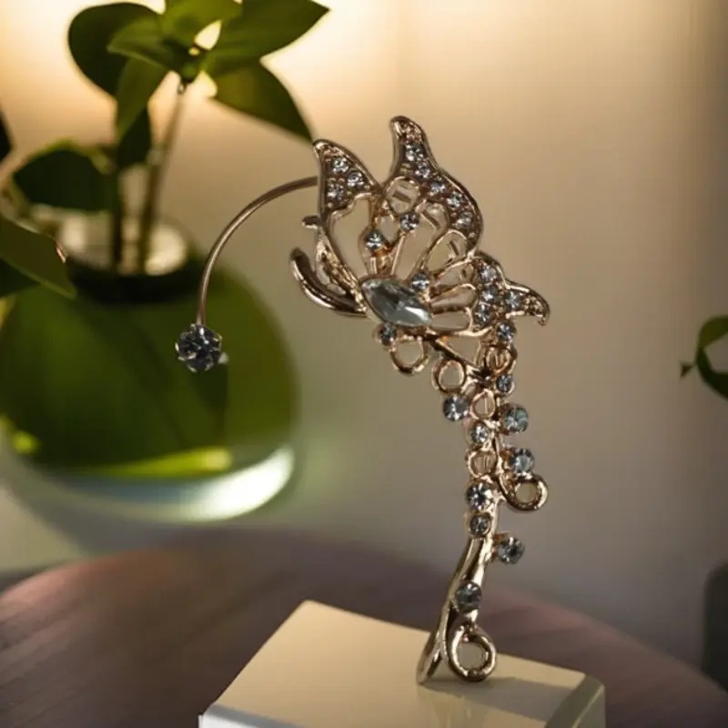 Hollow zircon butterfly gold left ear si