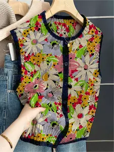 French retro style loose crew neck sleeveless color-block buttoned khaki women's sweater vest with color-block floral print. Suitable for spring and summer women's wear, versatile women's buttoned sleeveless knitted sweater, vacation style, casual elegant