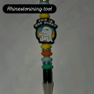 Rhinestone tool for placing and adjusting rhinestones on cups and other projects