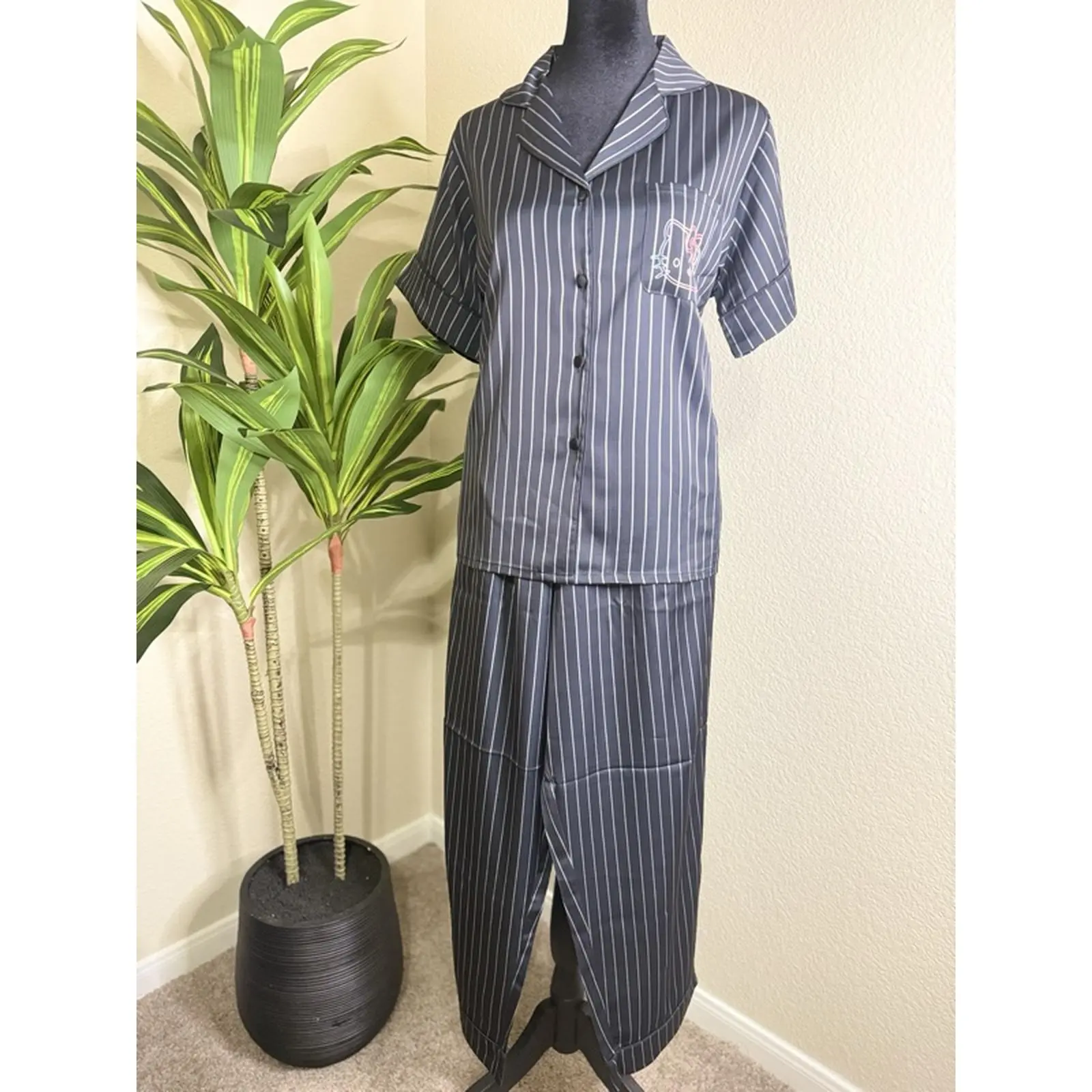 Striped Pajama Set with Short Sleeves and Button Front, Featuring a Pocket and a Logo, Ideal for Comfortable Sleep