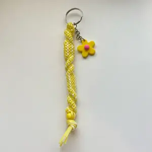 Sunshine Bloom Rexlace Keychain with Yellow/White Braided Design and Flower Charm Accessory