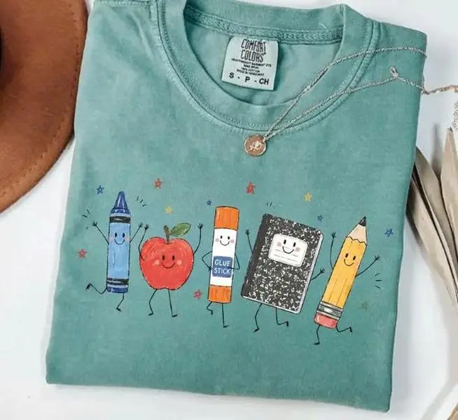Comfort Colors Cute School Supplies Heritage Graphic Tee, Aesthetic Back To School Spirit Shirt, Radiant Teacher Crayon Apple Pencil Notebook Top, Thoughtful Classroom Sublimation Gift Boutique Heritage Apparel