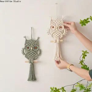 A Macrame Wall Hanging Featuring a Bohemian Style, This Creative Handmade Tapestry Showcases an Owl Design for Wall Decoration
