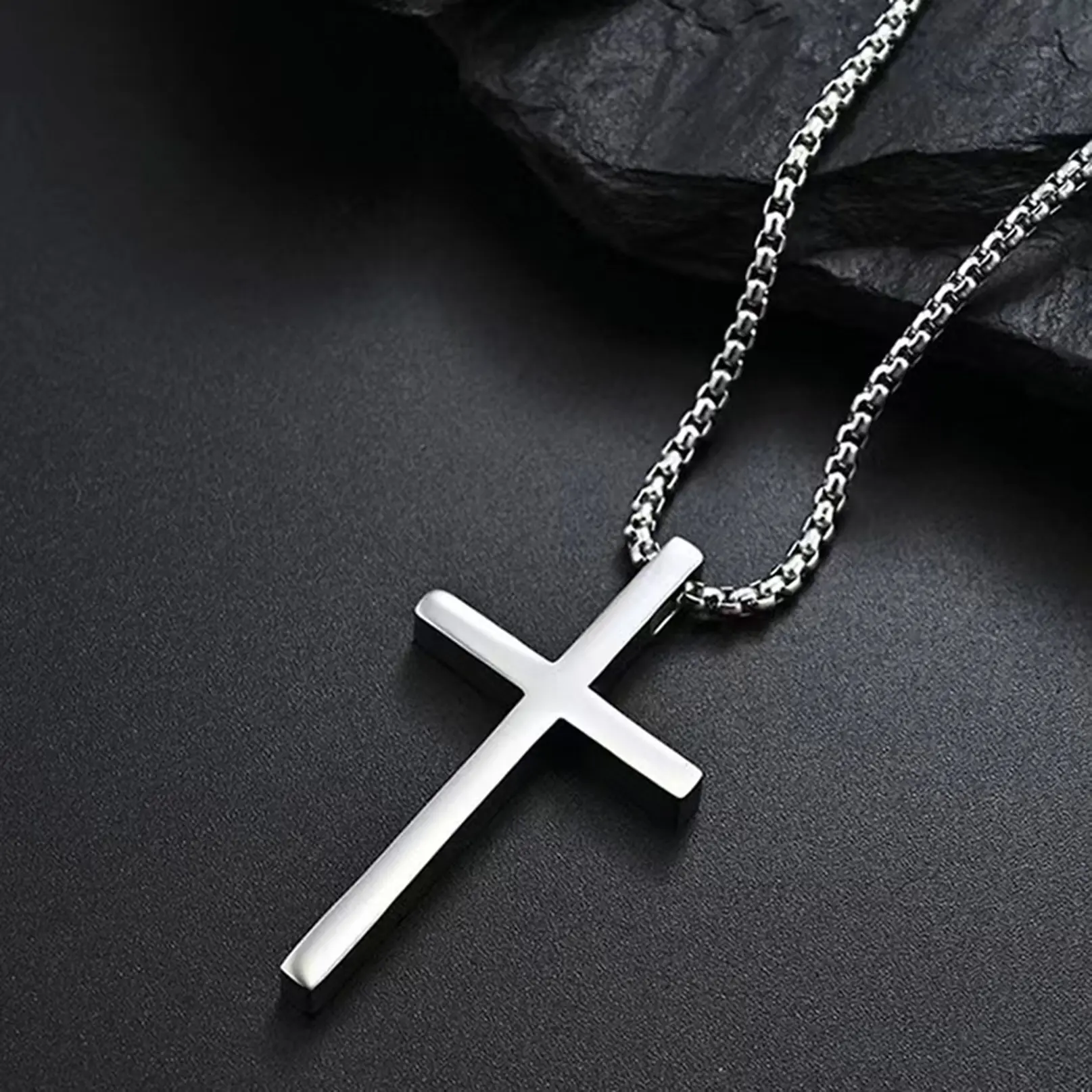 Black and white titanium alloy glossy cross, cross size 2.5*4 cm. Fashion accessories long sweater chain. Two specifi cations of chain length are 60 and 70 cm. Stylish unisex sweater chain.