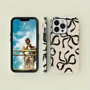 A Black Bow Cream-Colored Phone Case, Compatible with Iphone 11, 12, 13, 14, 15, 16,17 Pro Max And Pro Plus Series - a Stylish And Creatively Designed New Phone.MFL124