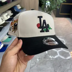 New Era 9FIFTY LA Dodgers Cap For Men And Women – Cream Adjustable Snapback Baseball Hat with Black Logo & Side Patch MLB Streetwear Style