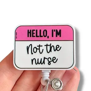 Glitter My Badge Not the nurse funny badge reel for nurse and hospital workers. Badge clip Badge pull - Retractable swivel clip with a 360 rotation. Great gift for coworkers.