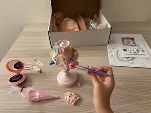 DIY Charm Decor Craft Kit - All-in-One Set. Blind Box: Includes 1 Main Decorative Item + Mini-Brush + 3-5 Hair Clips + 3 Cream Glue Colors + 20-30 Charms