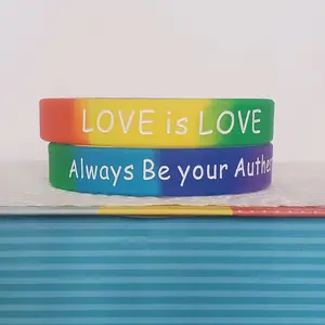 LGBTQIA+ PRIDE Silicone Wristbands saying "LOVE is LOVE" on one side, and "Always Be your Authentic Self" on the other side.