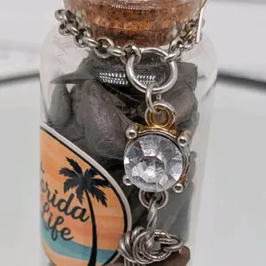 Handcrafted Florida Before Us genuine authentic one of a kind shark tooth filled trinket bottle ornament featuring a wire wrapped shark tooth by ToothRaiders