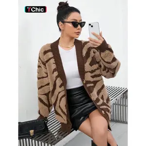Women’s zebra-striped knit cardigan, casual loose long-sleeve pullover, elegant color-block design, fashionable for autumn and winter