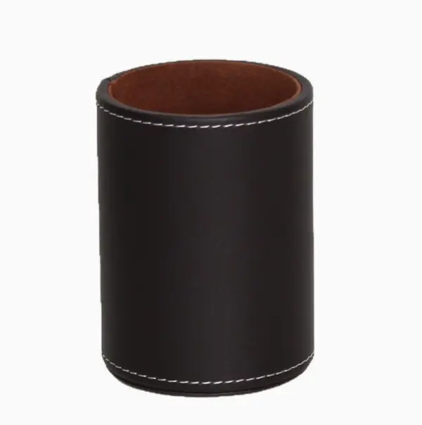 Cylindrical faux leather pen holder, classic black exterior, brown suede inner lining, neat white contrast stitching. Elegant desk storage for pens, makeup brushes and small office supplies.