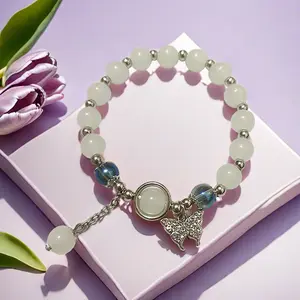Butterfly Charm Elegant Beaded Bracelet - Symbol of Transformation and Grace