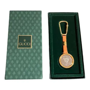 Pre-owned GUCCI Metal & Leather Bag Charm GUCCI: Gold, Silver Tone "GG" Logo Key Chain