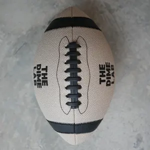 The Dime Football in Khaki - Raised textured laces and game-day grip