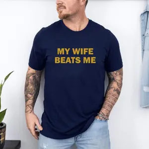 My Wife Beats Me Funny T-Shirt, Sarcastic Husband Humor Tee, Gag Marriage Gift Idea, Valentine or Anniversary Joke Shirt, Unisex Cotton Graphic Tee for Married Guys - HARSIN