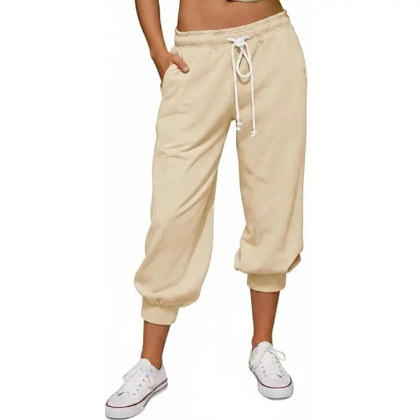 Fisoew Women's Sporty Chic Black Capri Jogging Pants - Elastic Waistband, Drawstring, Pocketted Pants, Peplum Design, Stretch Hem Trousers, Capri Pant Style