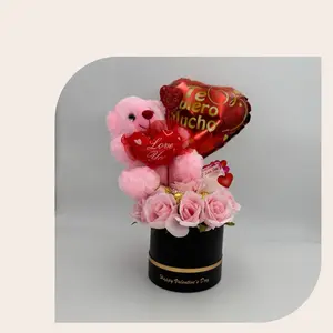 Caja redonda de rosas y oso