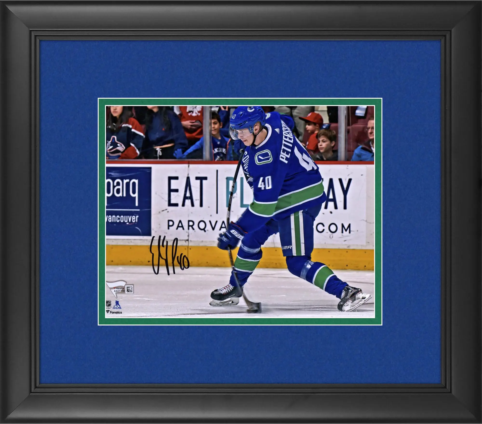 Elias Pettersson Vancouver Canucks Framed Autographed 8" x 10" Blue Jersey Shooting Photograph - Fanatics Authentic Certified