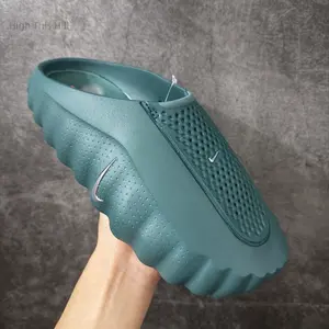 Solid Teal Green Integrated Soft EVA Foam Slip On Clogs Forefoot Dense Dot Perforated Breathable Patch Full Tiny Dot Perforated Body Segmented Wavy Contour Waterproof Cushion Sole Casual Slides For Gym Pool Beach Shower