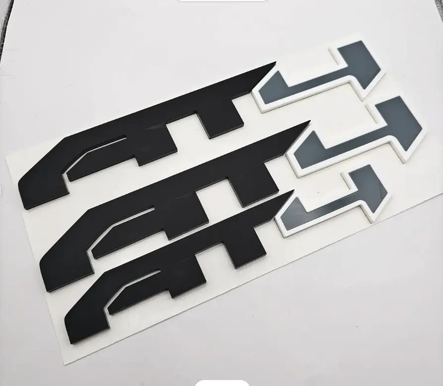 GMC "AT4" Emblem Set