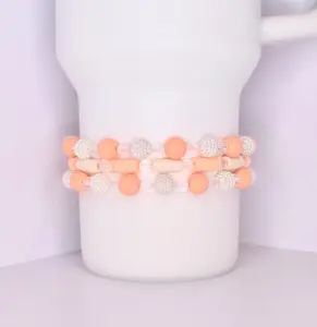 Peaches and Cream Bracelets: Orange & Ivory Accessory