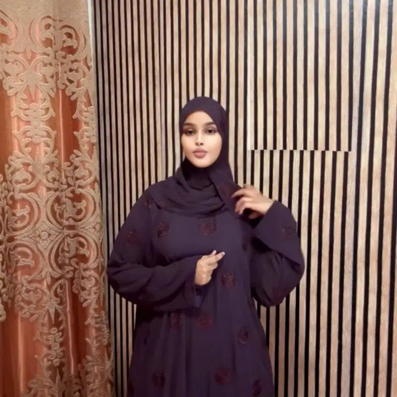 This is Close Abaya with hijab and Double Chiffon - Woven Polyester 100% with Unique Pleats & Contrast Binding for Premium Durability and Sophisticate