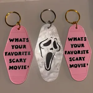 Scream Key Chain - What's Your Favorite Scary Movie Design in Pink and Silver Colors with Gold Rings