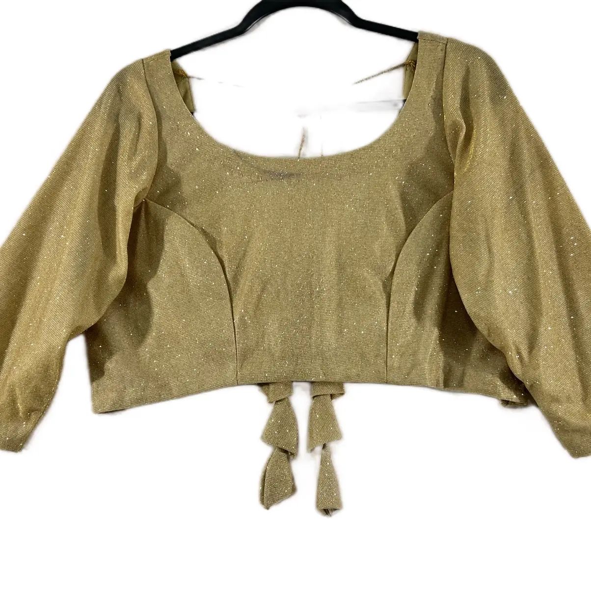 Trendy Women's Golden Shimmer Fitted Blouse with Stylized Back Design and Stylish Dori with Tassels. Matches a variety of Saree and Lehnga Choices.