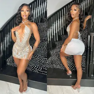 New arrival on Amazon: Women's sexy mesh rhinestone sheer nightclub dress.