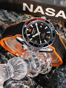 A men's orange tape paired with a black mesh soft, skin friendly, non stick circular gear shape, big numbers for easy reading, night light, waterproof calendar, fully automatic Analog mechanical watch Automatic Watches