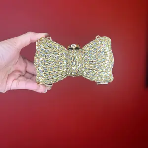 Kundan Bow Clutch - Elegant Gold Color Bow Design Handbag for Special Occasions