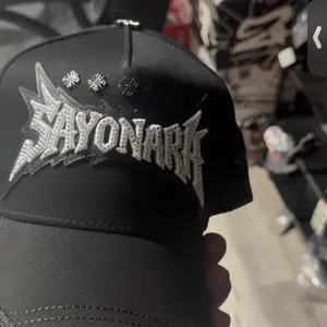 Baez x Shifu Sayonara Black Baseball Cap with Glittering Embroidery and Cross Decorations
