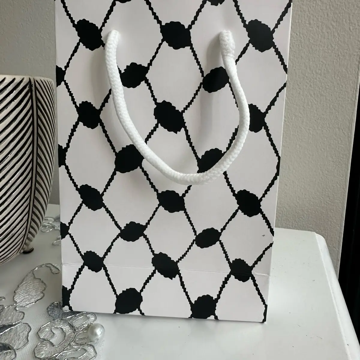 Three Keffieyeh print gift bag Three Keffieyeh print gift bag