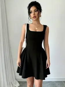 A fashionable black toned waist cinched short dress for women, with a sharp cut outlining the waistline, suitable for commuting to work, shopping, and outdoor wear