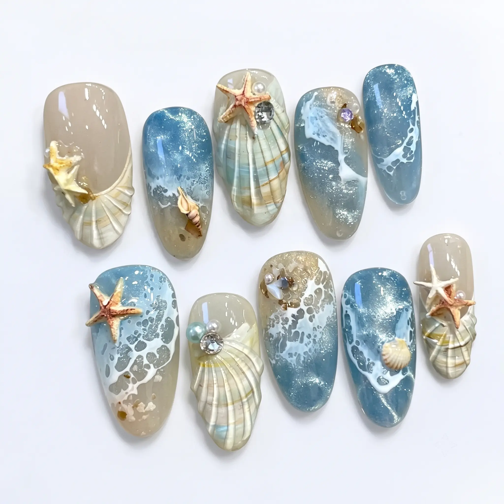 Zatvios Ocean Blue Oval Press-On Nails - Glamorous Artificial Nail Art Accessories with 3D Shells, Shell Starfish Accents, Hand-Drawn White Wave Pattern, Glossy Finish, Playful Yet Elegant Beach Chic Quick Transformation