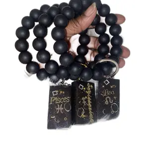 Leo Sagittarius and Pisces Zodiac Beaded Wristlet Keychain with Astrological Charms and Black Beads for Astrology Enthusiasts