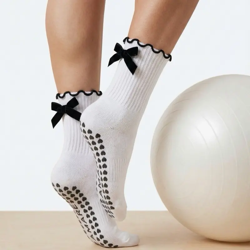 White Grip socks with black bow Soft Stretchy Secure for Pilates Yoga Size 6-9 Comfy Fit