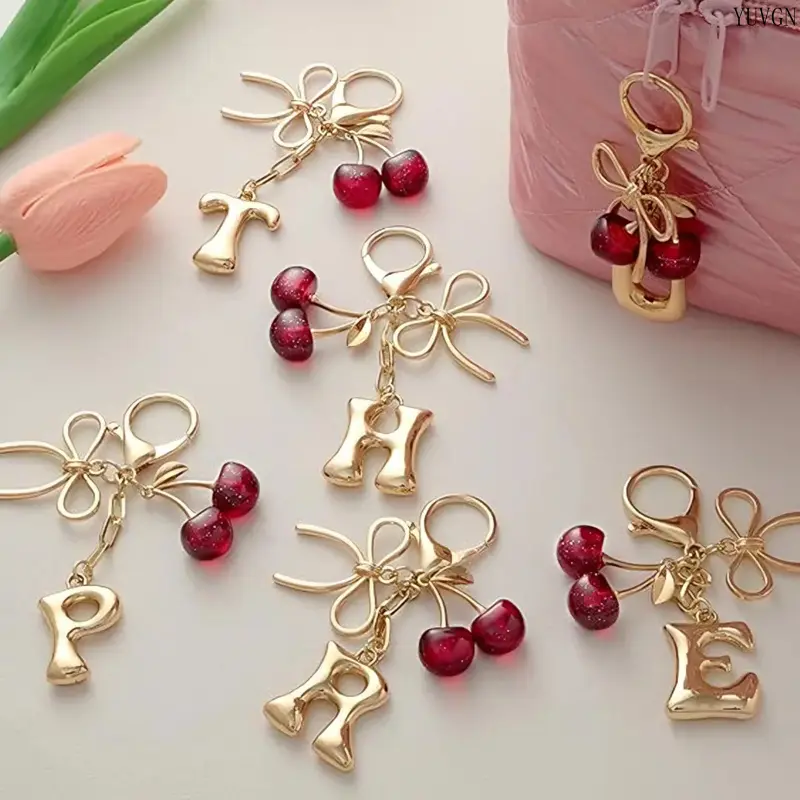 Unisex Gold-Plated Cherry Letters Bow Knot Keychain, Glitter Alphabet Pendant Bag Charm, Casual Key Ring for Wallet Backpack Car Keys, Personalized Gift for Leisure Enthusiasts