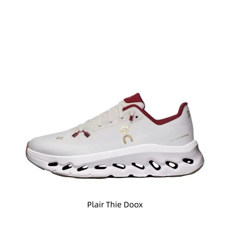 Off-white lightweight running sneakers with breathable one-piece engineered mesh, burgundy collar & gold logo, hollow wave shock-absorbing midsole and gum rubber outsole
