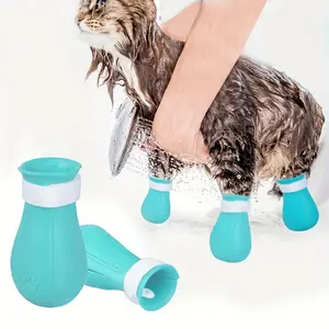 Four adjustable cat paw protection covers designed to prevent scratching, suitable for grooming, bathing, and shaving. Prevent biting and scratching, nail trimming and foot covers, and prevent licking during feeding
