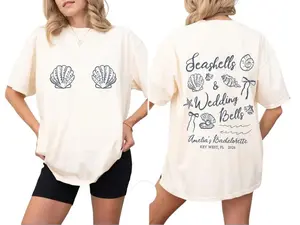 Seashells & Wedding Bells Bachelorette T-Shirt Coastal Bridal Party Graphic Tee Beach Girls Trip Outfit Bride Squad Unisex Gift S-5XL Ivory 100% Cotton
