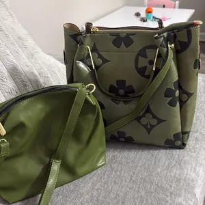 An elegant floral embossed faux leather handbag - suitable for women's use - fade resistant zipper tote bag - equipped with fixed shoulder straps - polyester lining - edge painted - suitable for work and various occasions