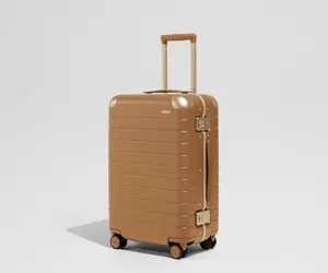 The Aluminum Edge Bigger Carry-On in Cognac Brown