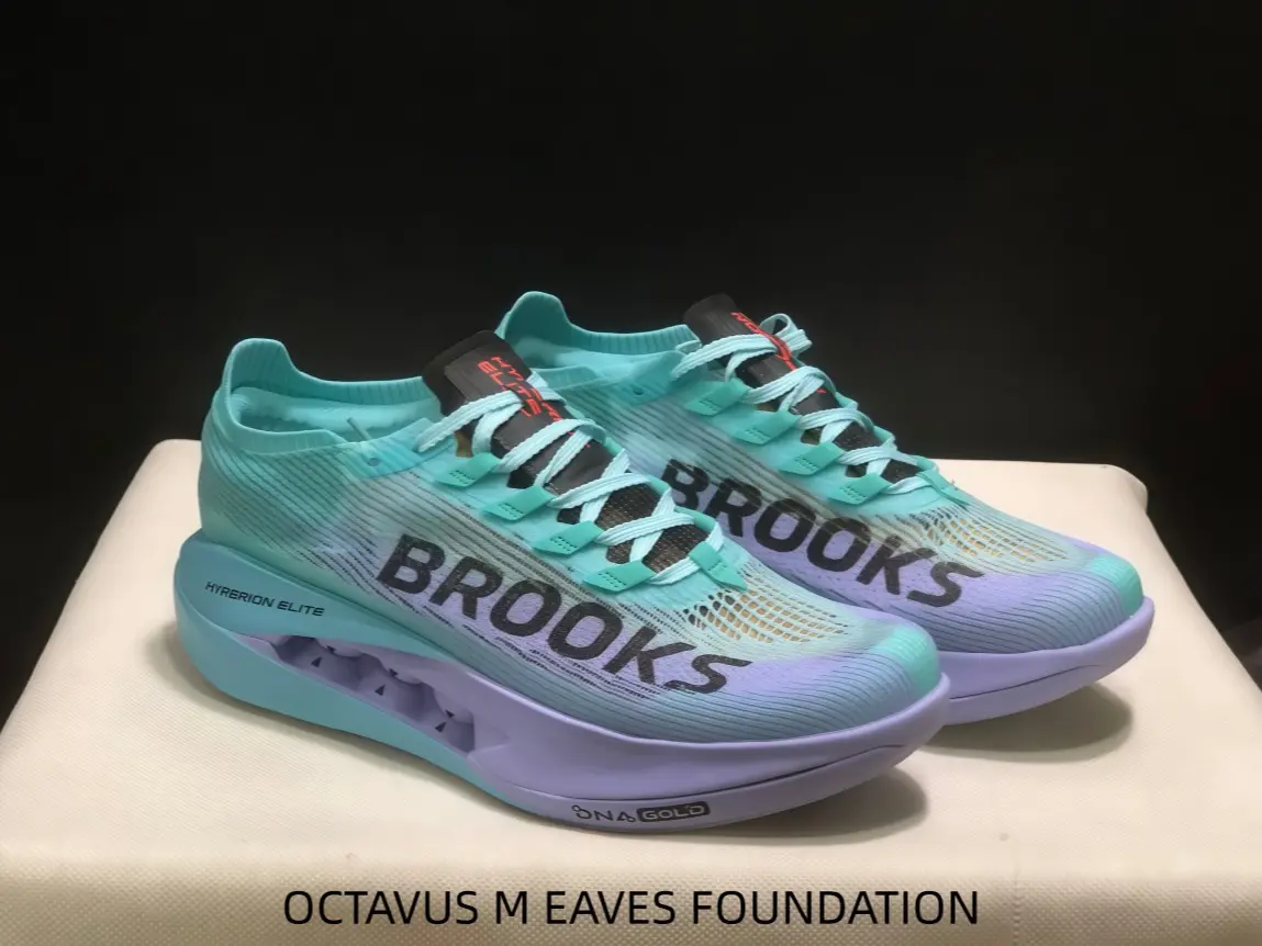 These gradient-hued running shoes with breathable knit upper and responsive midsole deliver speed and comfort for morning jogs or weekend races, pairing effortlessly with casual shorts for athletes who value performance without sacrificing style.
