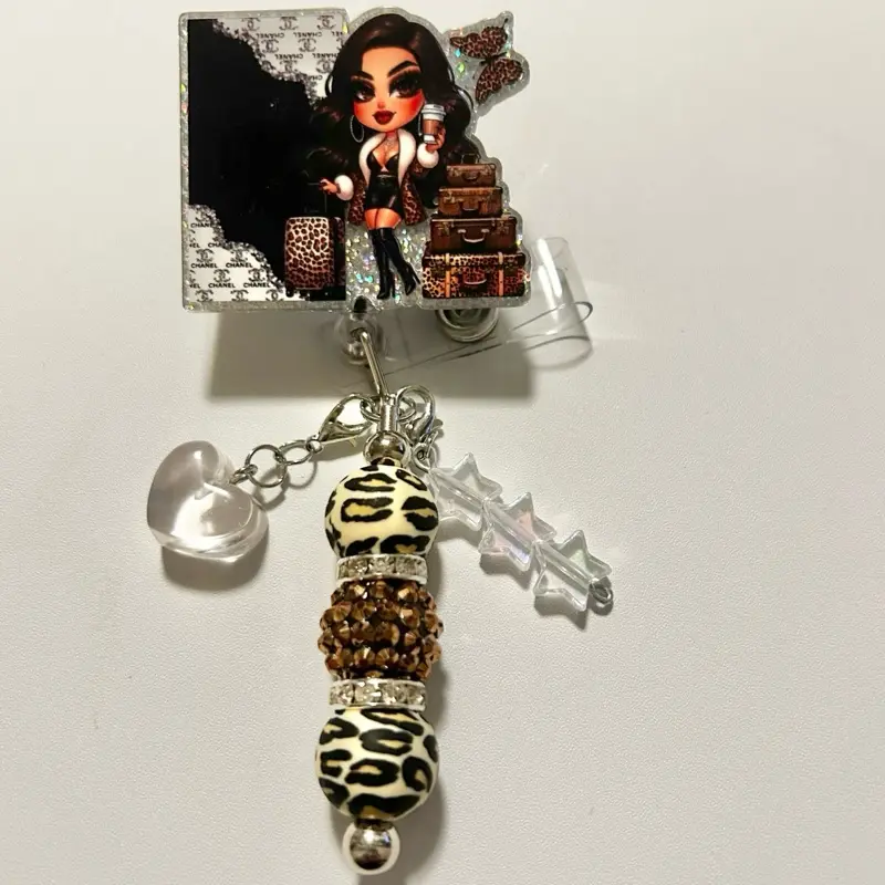 Charmed- Cute trendy retractable badge reel with alligator clip and colorful beads. Charms may vary from photo but will match colors in acrylic piece.